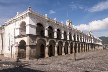 Yellow and white Baroque style building in Antigua, guatemala. Located in the main square
