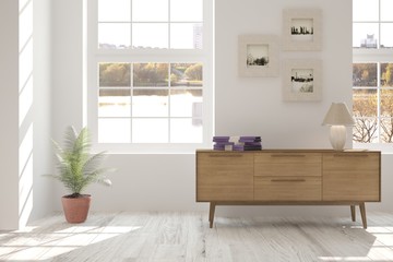 White living room interior with shelf