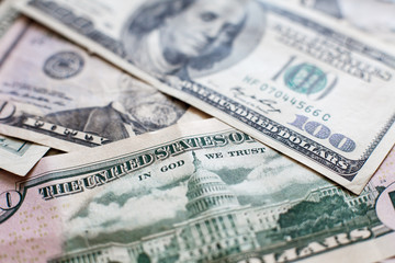 Pile of hundred dollar banknotes