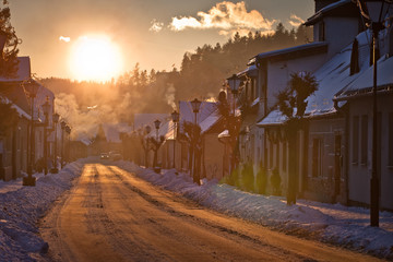 Słoneczny zimowy dzień w górskim mieście Muszyna. Sunny winter day in the mountain in Muszyna - Poland.   © rogozinski