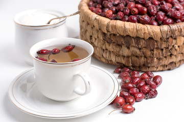 tea from rosehip on a white background