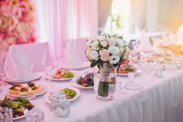 Beautiful wedding restaurant for marriage. White decor for bride and groom.