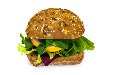 Sandwich with sausage and vegetables, whole wheat bread