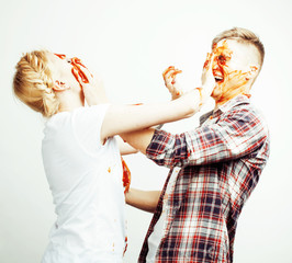 young pretty couple, lifestyle people concept: girlfriend and boyfriend cooking together, having...