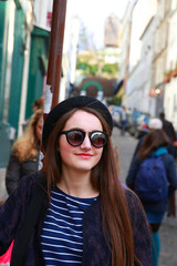 Close-up portrait of beautiful girl in the city