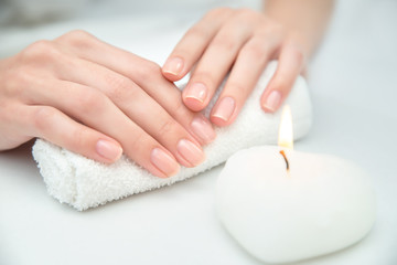 Woman getting nail manicure. - obrazy, fototapety, plakaty