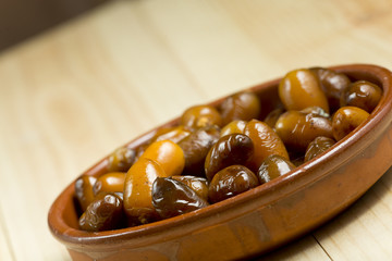 Dates in a clay pot.