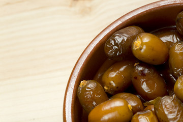 Dates in a clay pot.