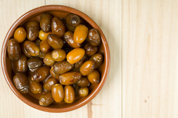 Dates in a clay pot.