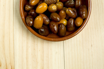 Dates in a clay pot.