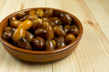 Dates in a clay pot.