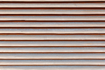 brown shutters closeup, wood background