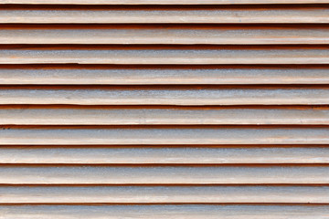 Obraz premium brown shutters closeup, wood background