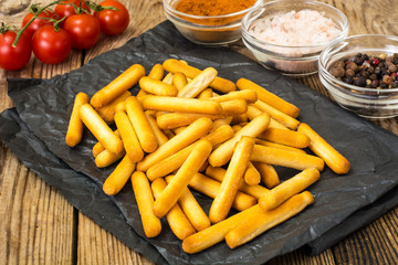 Crispy bread sticks with salt and spices