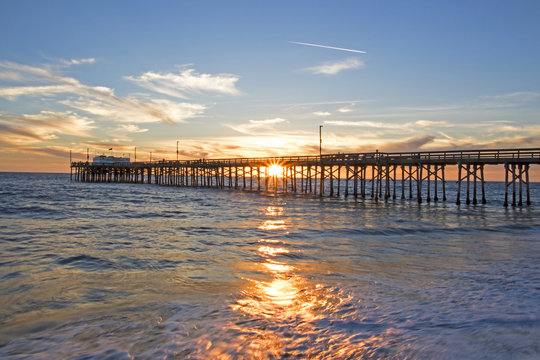 Fototapeta Beach sunset at Newport Beach, California during winter