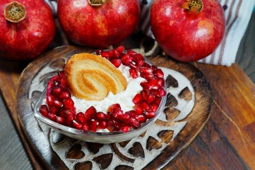 white cream cheese foster pomegranate seeds