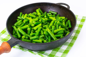 Green Beans on cast-iron frying pan