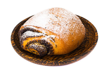Buns with poppy seeds and icing sugar