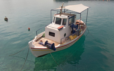 fisherman boat at haven of Loutraki, Greece