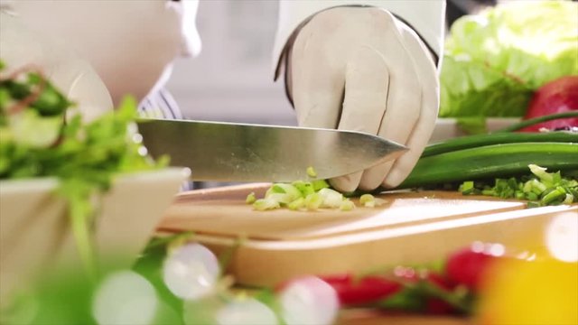 cutting vegetables in kitchen 