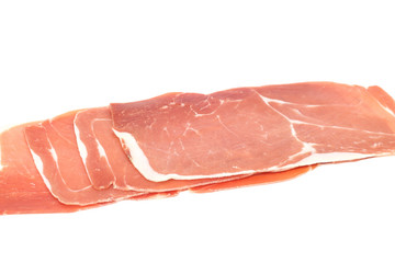 closeup on a piece of spanish serrano ham