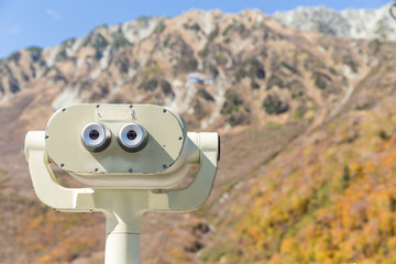 Binocular viewer in natural landscape