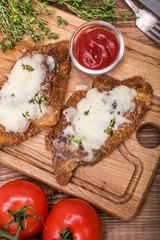 Baked chicken parmesan .