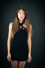 Fototapeta premium Beautiful woman doing different expressions in different sets of clothes: angry