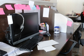 office table with PC and different stationery on it