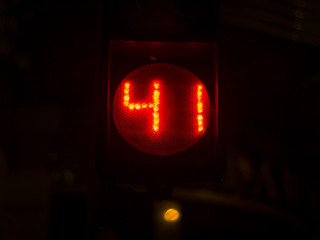 Street light numbers in the night. Low light photo.