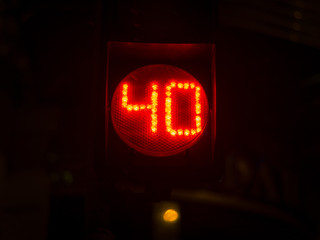 Street light numbers in the night. Low light photo.