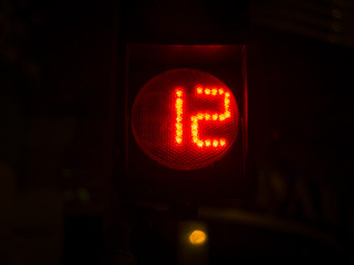 Street light numbers in the night. Low light photo.