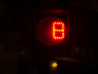 Street light numbers in the night. Low light photo.