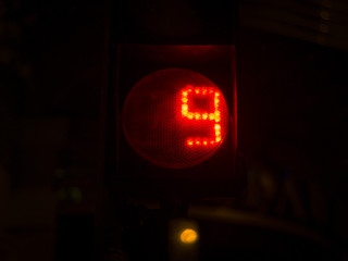 Street light numbers in the night. Low light photo.