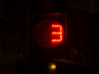 Street light numbers in the night. Low light photo.