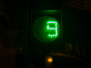 Street light numbers in the night. Low light photo.