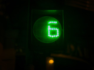 Street light numbers in the night. Low light photo.