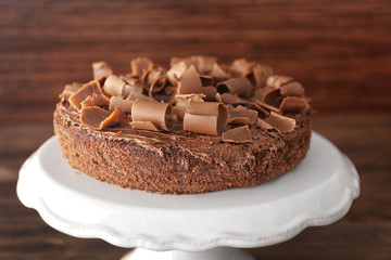 Delicious chocolate cake on stand