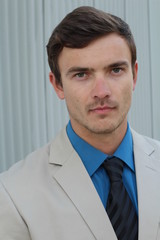 Conceited elegant businessman close up