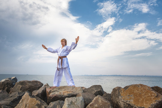 Young boy training karate