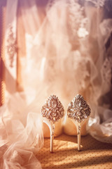 luxury white  shoes on high heels and  veil. wedding concept