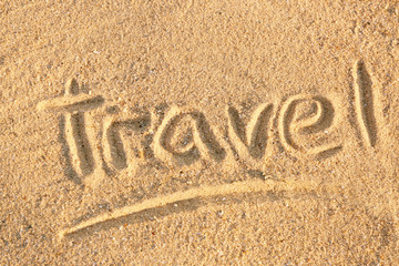 Handwritten inscription on sea sand, close up view