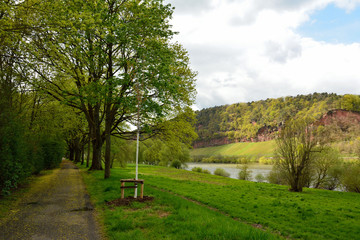 Pathway in park along Moselle River in Trier, Germany. 