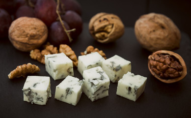 Pieces of blue cheese and walnuts