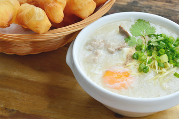Pork congee with deep-fried dough stick.
Rice porridge  with liver,minced pork,egg and deep - fried dough stick .
