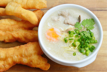 Pork congee with deep-fried dough stick.
Rice porridge  with liver,minced pork,egg and deep - fried dough stick .
