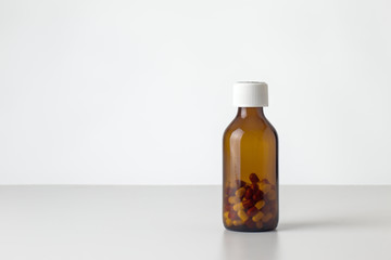 still life image of pill bottle