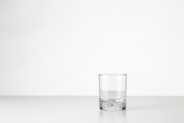 whisky glass on white