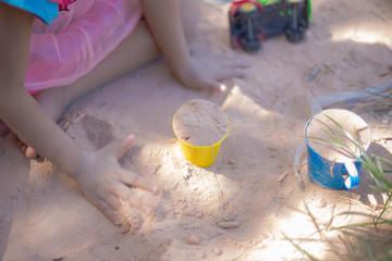Adorable little girl who is happy to play.