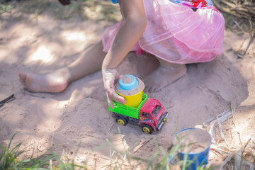 Adorable little girl who is happy to play.